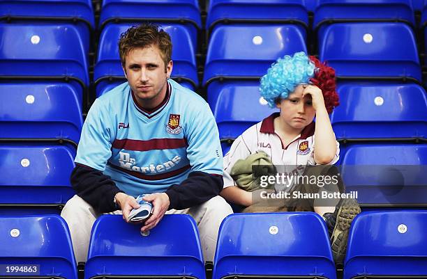 West Ham United fans look dejected after their team are relegated after the FA Barclaycard Premiership match between Birmingham City and West Ham...