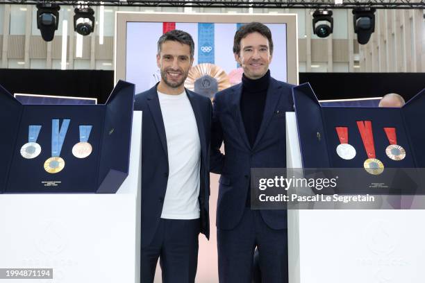 Tony Estanguet and Antoine Arnault attend the unveiling of the Paris 2024 Olympic and Paralympic Games Medals At Paris 2024 Headquarters on February...