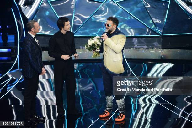 Italian TV host Amadeus , Italian singer Diodato and Italian rapper Dargen D'Amico at 74 Sanremo Music Festival. Second evening. Sanremo , February...