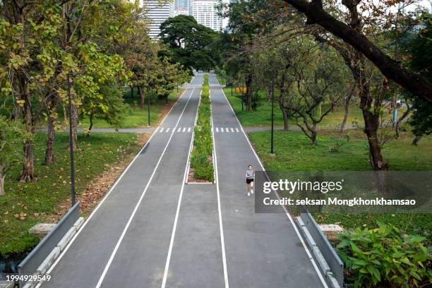 jogging in the park - melbourne racing stock pictures, royalty-free photos & images