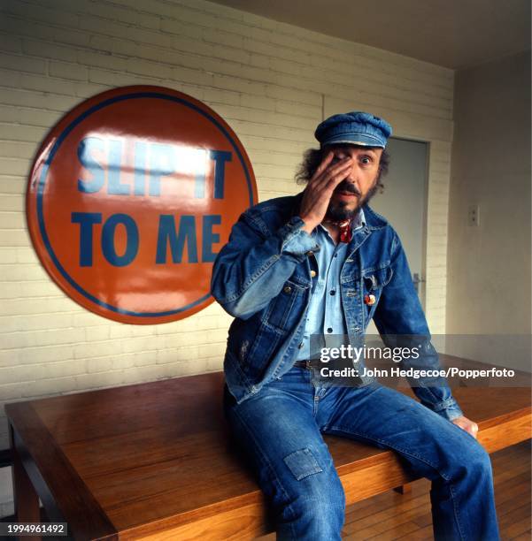 English painter and collage artist Richard Hamilton , one of Britain's first pop artists, posed in England in 1972. Hamilton is wearing a denim...