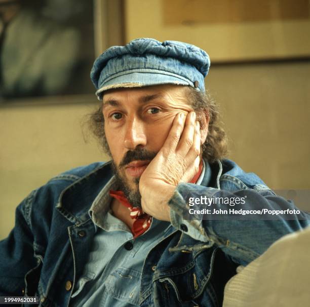 English painter and collage artist Richard Hamilton , one of Britain's first pop artists, posed in England in 1972. Hamilton is wearing a denim...
