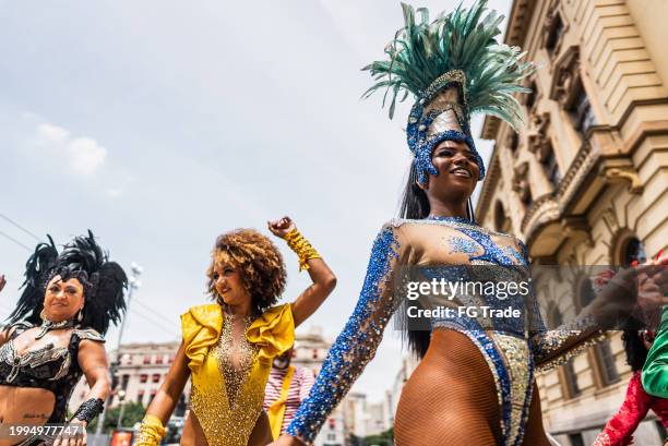 people having fun at a street carnival party - rio carnival stock pictures, royalty-free photos & images