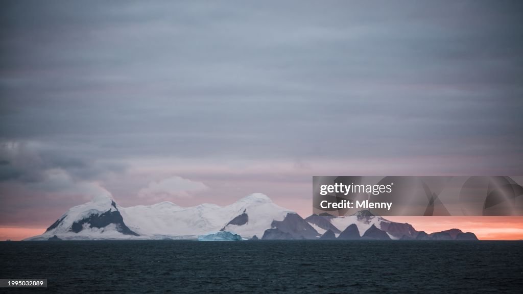 Antarctica Coastal Islands Sunset Iceberg under Colorful Skyscape Panorama