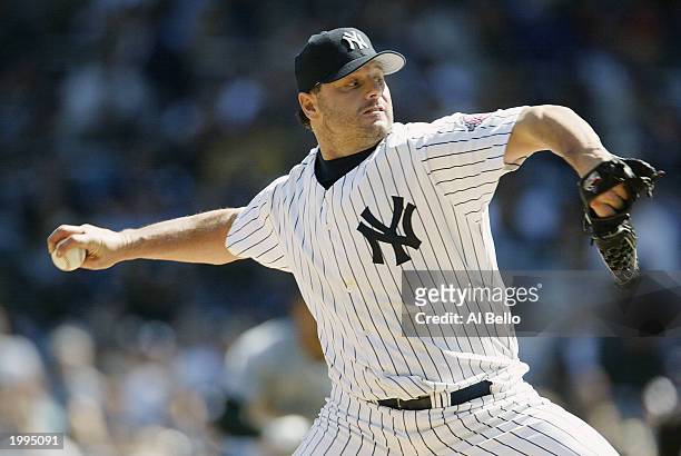 Pitcher Roger Clemens of the New York Yankees throws against the Tampa Bay Devil Rays during the game at Yankee Stadium on April 13, 2003 in the...