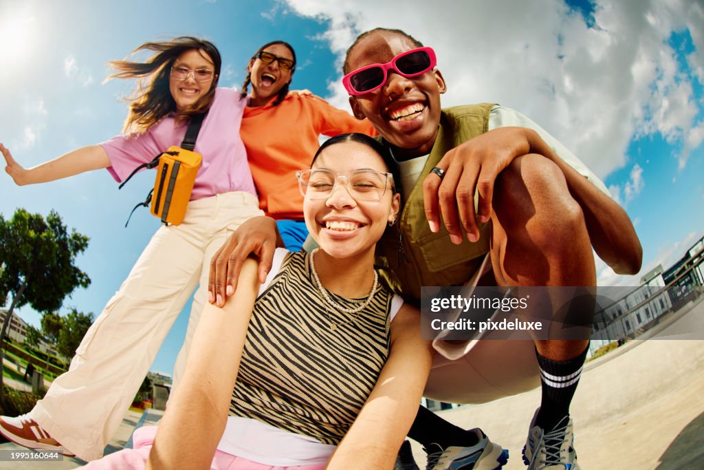 Wide angle shot of Gen Z group of friends hanging out together.