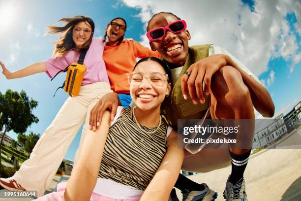 wide angle shot of gen z group of friends hanging out together. - fashion clothing stock pictures, royalty-free photos & images