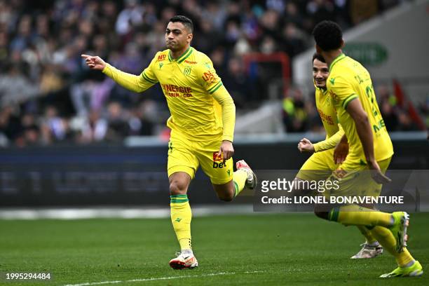 Nantes' Egyptian forward Mostafa Mohamed celebrates scoring his team's first goal during the French L1 football match between Toulouse FC and FC...