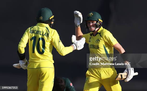 Callum Vidler and Rafael MacMillan of Australia celebrate following the ICC U19 Men's Cricket World Cup South Africa 2024 Semi-Final match between...