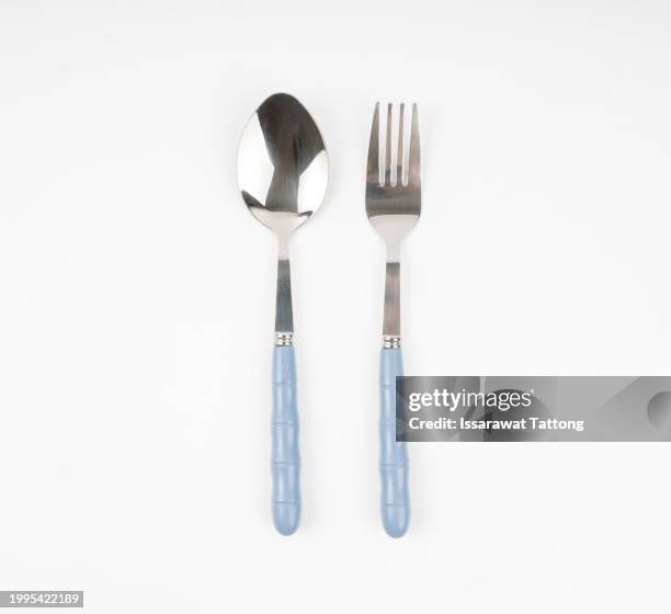 cutlery set with fork and spoon isolated on white background - gaffel bildbanksfoton och bilder