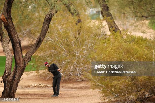 Erik van Rooyen of South Africa plays a second shot on the first hole during the first round of the WM Phoenix Open at TPC Scottsdale on February 08,...