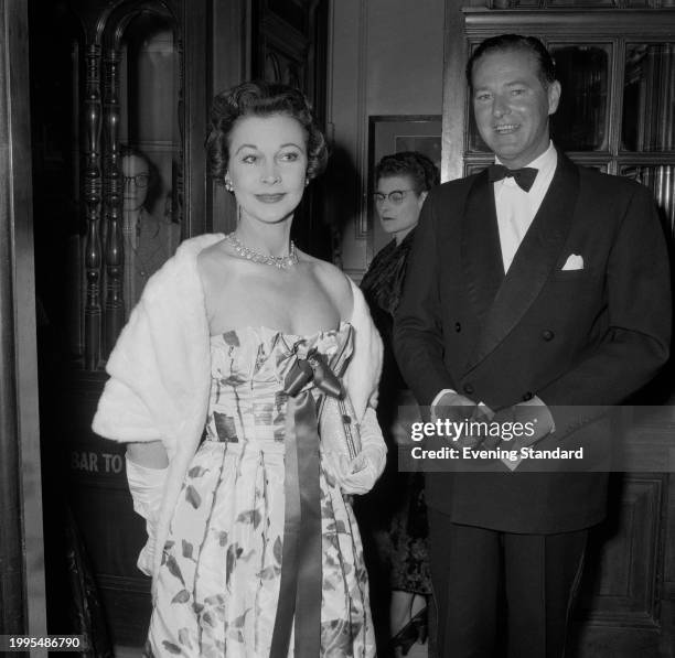 Actress Vivien Leigh with playwright Terence Rattigan at the opening night of play 'Summer of the Seventh Doll', New Theatre, London, April 30th 1957.