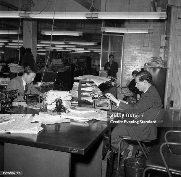 The political desk editorial staff of the Evening Standard newspaper, Shoe Lane, London, May 7th 1957.