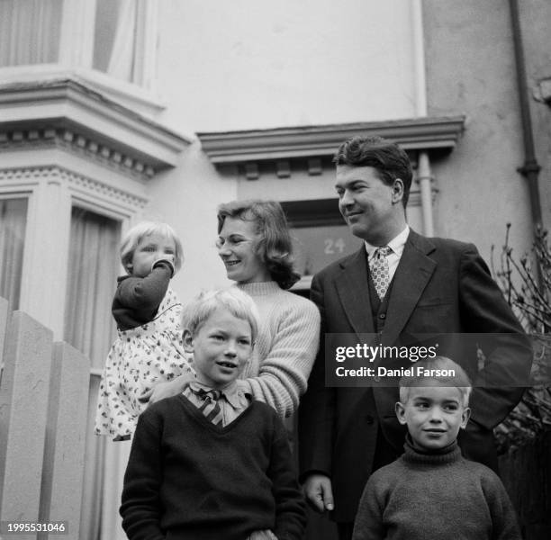 Writer Kingsley Amis with his family including wife Hilary Bardwell , Martin Amis , Philip Amis and Sally Amis outside their house at 24, The Grove,...