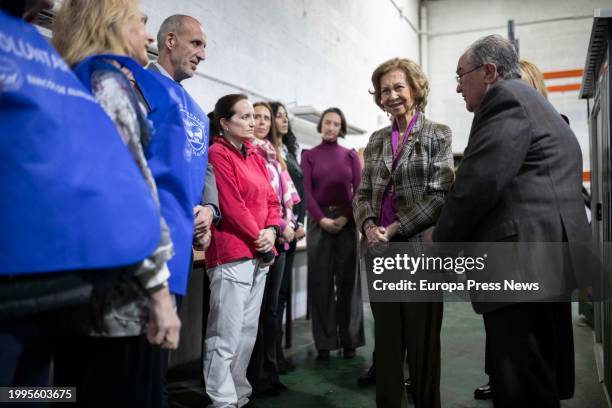 Queen Sofia talks with volunteers during her visit to the Food Bank, February 8 in Huelva, . Queen Sofia visits the facilities of the Food Bank of...