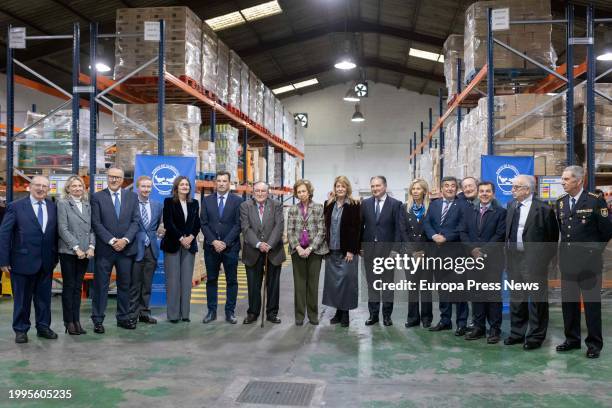 Queen Sofia presides over the family photo during her visit to the Food Bank, February 8 in Huelva, . Queen Sofia visits the facilities of the Huelva...