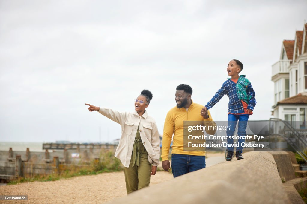 Family enjoying weekend break by sea