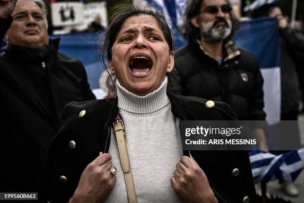 Protester shouts slogans during a demonstration against a reform legalising same-sex marriage and adoption, that will be debated by parliament next...