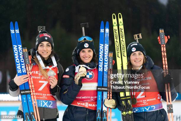 Lisa Vittozzi of Italy takes second place, Julia Simon of France takes first place, Justine Braisaz-Bouchet of France takes third place during the...