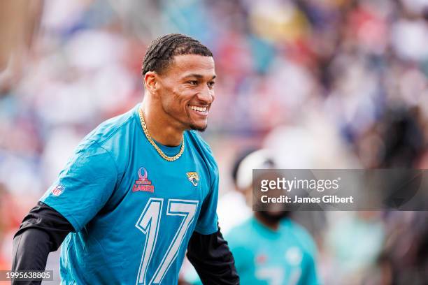 Evan Engram of the Jacksonville Jaguars and AFC celebrates after scoring a touchdown during the 2024 NFL Pro Bowl at Camping World Stadium on...
