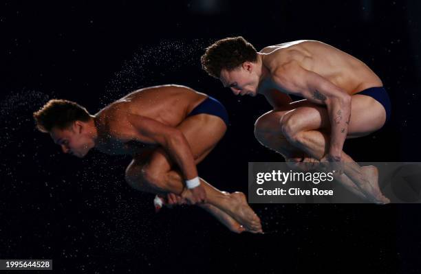 Thomas Daley and Noah Williams of Team Great Britain compete in the Men's Synchronized 10m Platform Final on day seven of the Doha 2024 World...