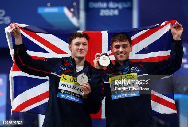 Silver Medalists, Thomas Daley and Noah Williams of Team Great Britain pose with their medals during the Medal Ceremony after the Men's Synchronized...