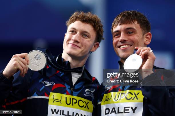 Silver Medalists, Thomas Daley and Noah Williams of Team Great Britain pose with their medals during the Medal Ceremony after the Men's Synchronized...