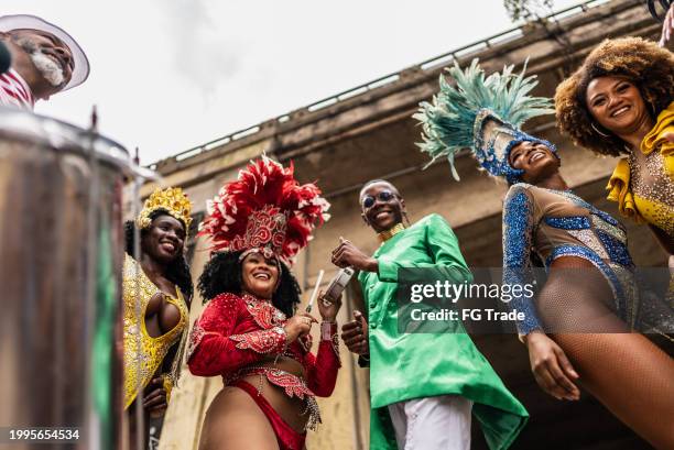 people having fun at a street carnival party - rio de janeiro party stock pictures, royalty-free photos & images