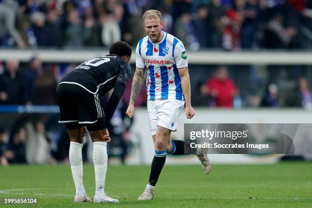 Chuba Akpom of Ajax, Luuk Brouwers of SC Heerenveen celebrates the victory during the Dutch Eredivisie match between SC Heerenveen v Ajax at the Abe...