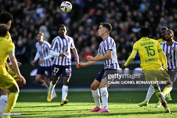 Toulouse's Dutch forward Thijs Dallinga looks at the ball during the French L1 football match between Toulouse FC and FC Nantes at the Stadium TFC in...