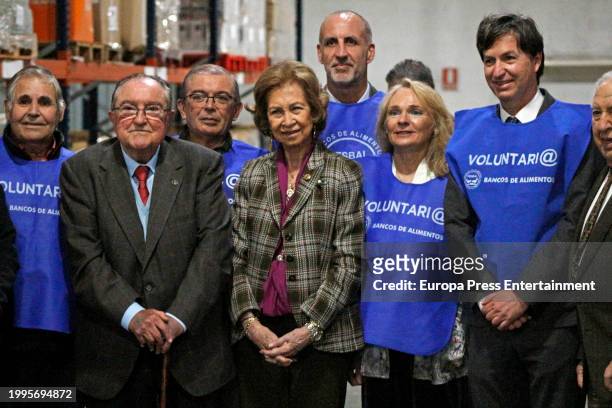 Queen Sofia of Spain presides over the family photo during her visit to the Food Bank, February 8 in Huelva, . Queen Sofia visits the facilities of...