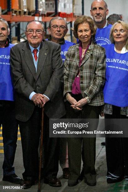 Queen Sofia of Spain presides over the family photo during her visit to the Food Bank, February 8 in Huelva, . Queen Sofia visits the facilities of...