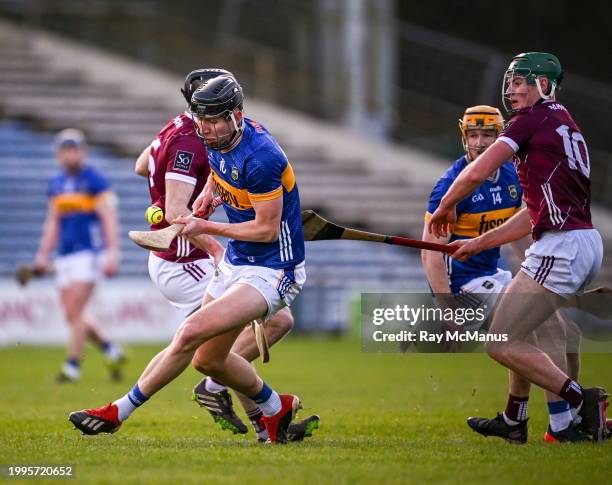 Tipperary , Ireland - 11 February 2024; Gearoid O'Connor of Tipperary is tackled by Gavin Lee of Galway during the Allianz Hurling League Division 1...