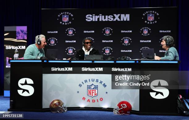 Rich Gannon, Deion "Coach Prime" Sanders and Bruce Murray speak on SiriusXM at Super Bowl LVIII on February 08, 2024 in Las Vegas, Nevada.
