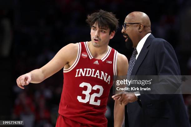 Head coach Mike Woodson of the Indiana Hoosiers talks with Trey Galloway during the game against the Ohio State Buckeyes at Value City Arena on...