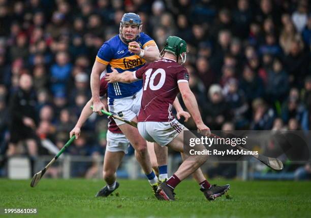 Tipperary , Ireland - 11 February 2024; Craig Morgan of Tipperary is tackled by Gavin Lee of Galway during the Allianz Hurling League Division 1...