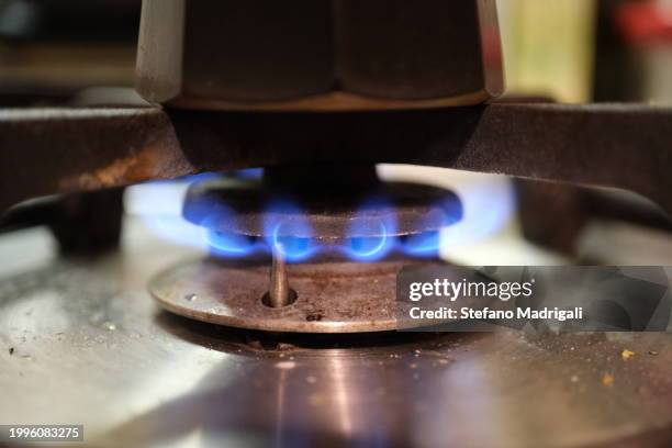 home kitchen and gas stove - glowing hot steel stock pictures, royalty-free photos & images