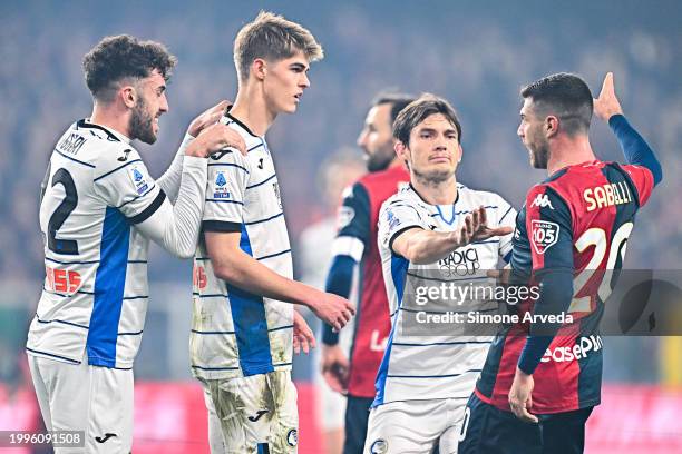 Charles De Ketelaere of Atalanta celebrates with his team-mates after scoring a goal as Stefano Sabelli of Genoa complains about his reaction during...