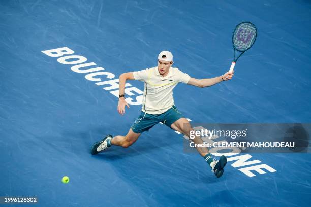 France's Ugo Humbert hits a return to Bulgaria's Grigor Dimitrov during their ATP Open 13 final tennis match on February 11, 2024 in Marseille,...