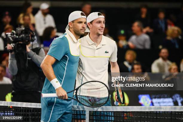 Bulgaria's Grigor Dimitrov and France's Ugo Humbert pose at the start of their ATP Open 13 final tennis match on February 11, 2024 in Marseille,...