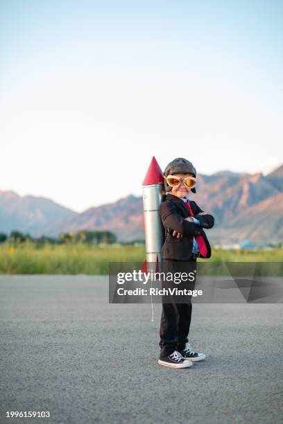 young boy businessman ready to fly - launch event stock pictures, royalty-free photos & images