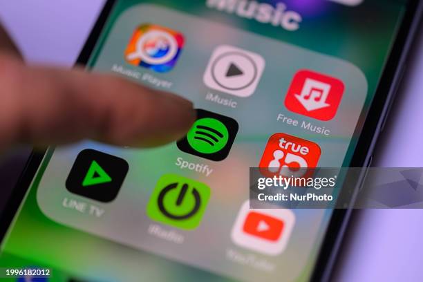 The Spotify app icon is being displayed on a smartphone in this photo illustration in Brussels, Belgium, on February 11, 2024.