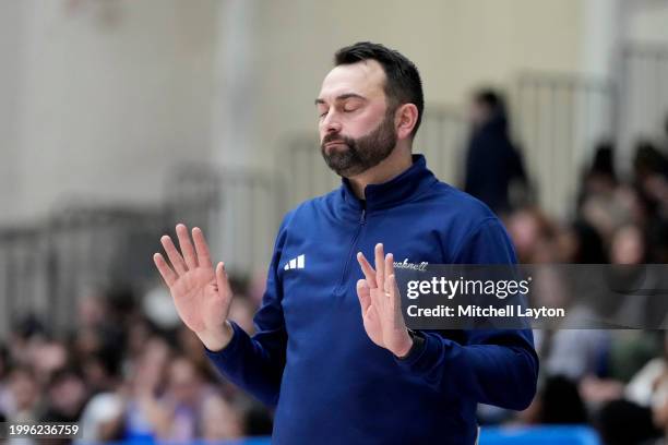 Head coach John Griffin III of the Bucknell Bison reacts to a call during a college basketball game against the American University Eagles at Bender...