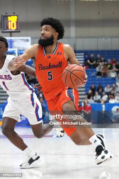 Elvin Edmonds IV of the Bucknell Bison drives to the basket during a college basketball game against the American University Eagles at Bender Arena...