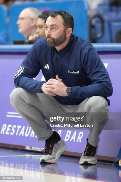 Head coach John Griffin III of the Bucknell Bison looks on during a college basketball game against the American University Eagles at Bender Arena on...