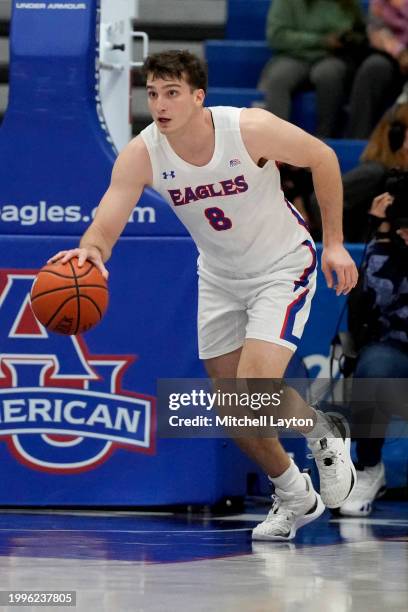 Lorenzo Donadio of the American University Eagles dribbles down court during a college basketball game against the Bucknell Bison at Bender Arena on...