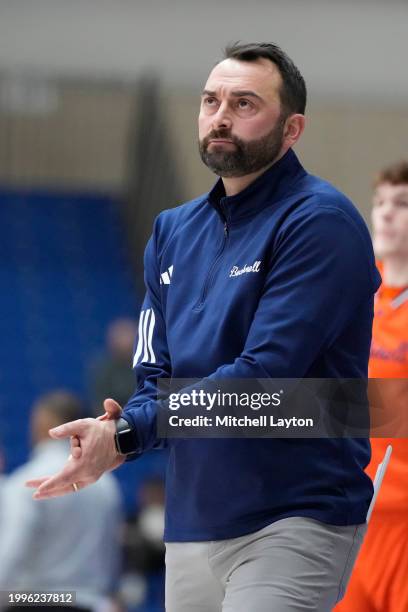 Head coach John Griffin III of the Bucknell Bison looks on during a college basketball game against the American University Eagles at Bender Arena on...