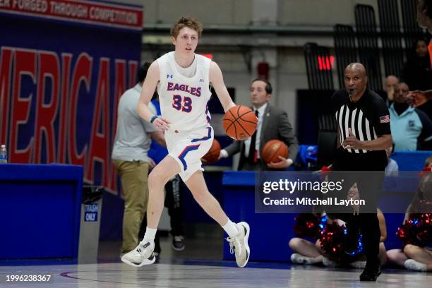 Matt Mayock of the American University Eagles dribbles down court during a college basketball game against the Bucknell Bison at Bender Arena on...