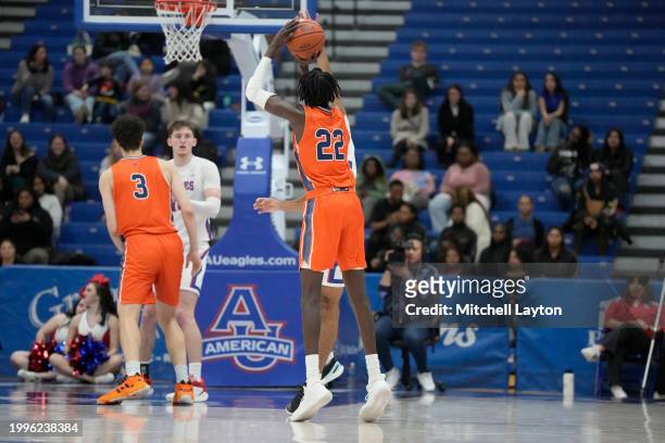 Ruot Bijiek of the Bucknell Bison takes a jump shot during a college basketball game against the American University Eagles at Bender Arena on...