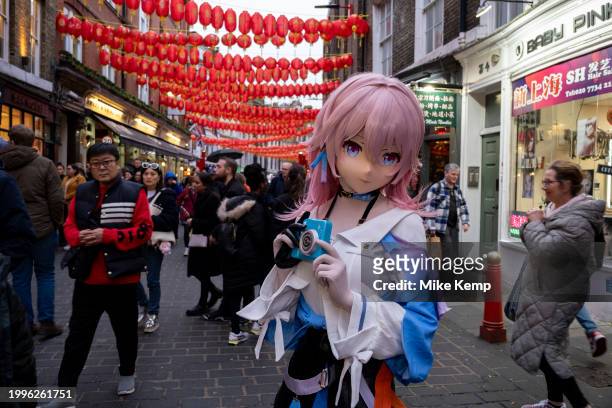 Young womoan dressed up as an animated character as people gather to celebrate the Chinese New Year of the Dragon in Chinatown on 10th February 2024...